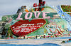 Salvation Mountain : Salvation Mountain is a colorful artificial mountain north of Calipatria, California, near Slab City. It is made from adobe, straw, and thousands of gallons of paint. It was created by Leonard Knight to convey the message that "God Loves Everyone". Mr. Knight claims to have refused substantial donations of money and labor from supporters who wished to modify his message of universal love to favor or disfavor particular groups.(wikipedia) Without commenting on his message, we found Salvation Mountain to be visually stunning.